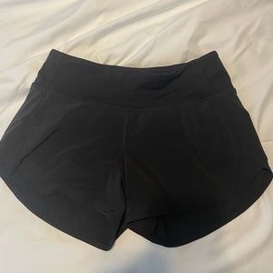 Black mid rise lululemon speed up shorts size 4